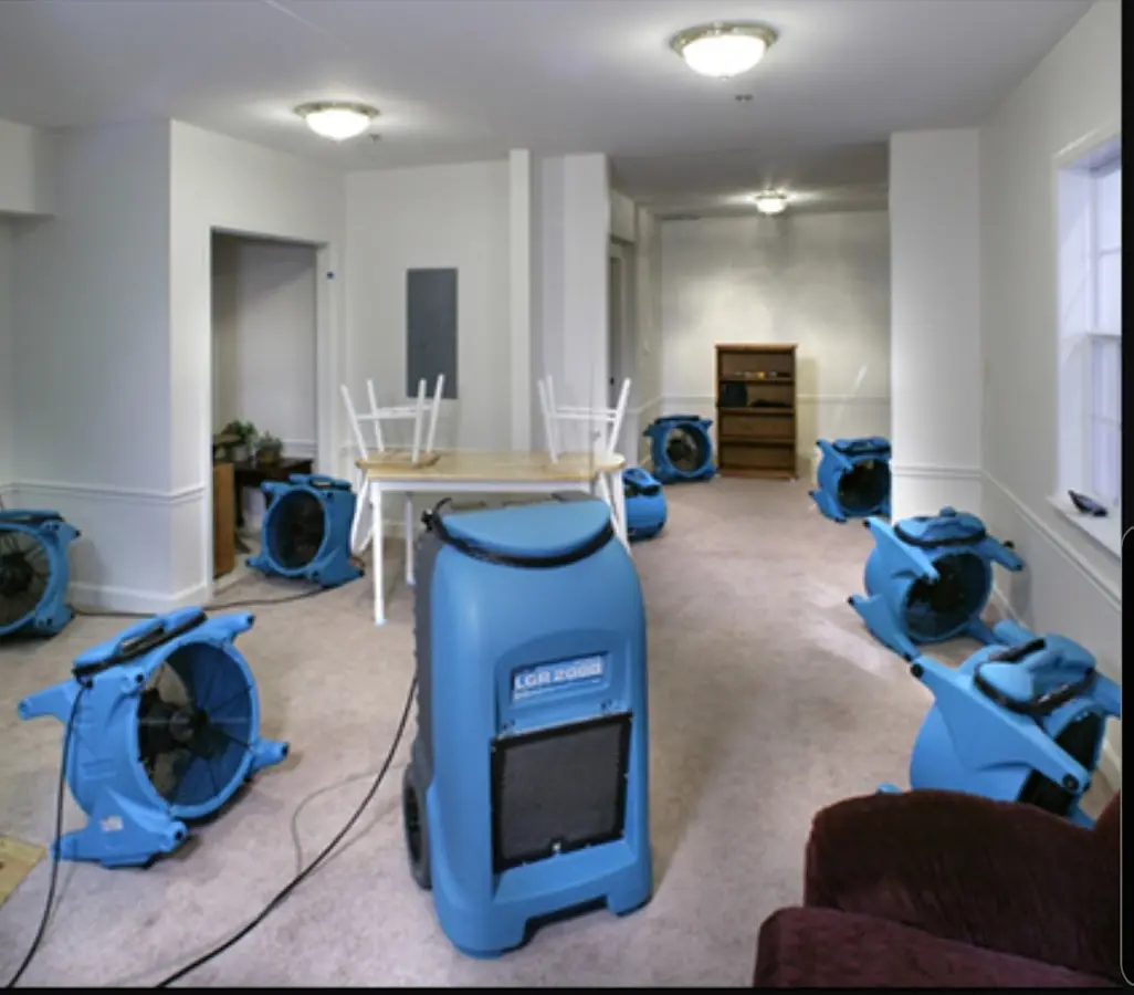 Air movers and dehumidifier setup for Water Damage Restoration in Burnt Mills